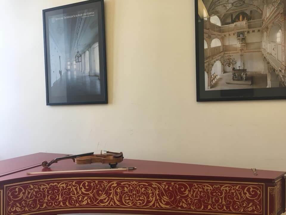 Violin placed on a harpsichord